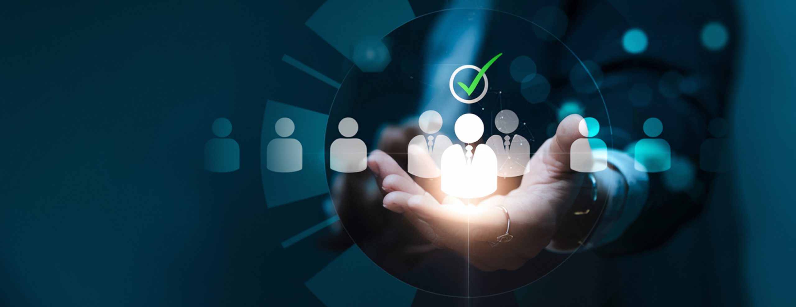 Hands cradle glowing human icons with a green checkmark, symbolizing verified or approved recruitment.